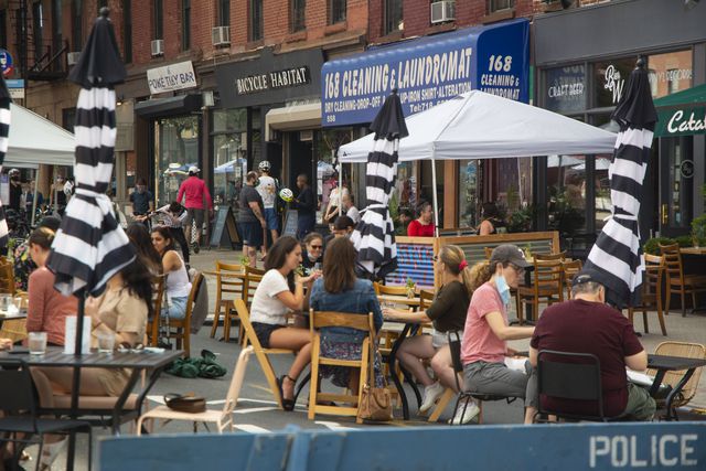 A photo of outdoor diners on Vanderbilt Avenue in Prospect Heights